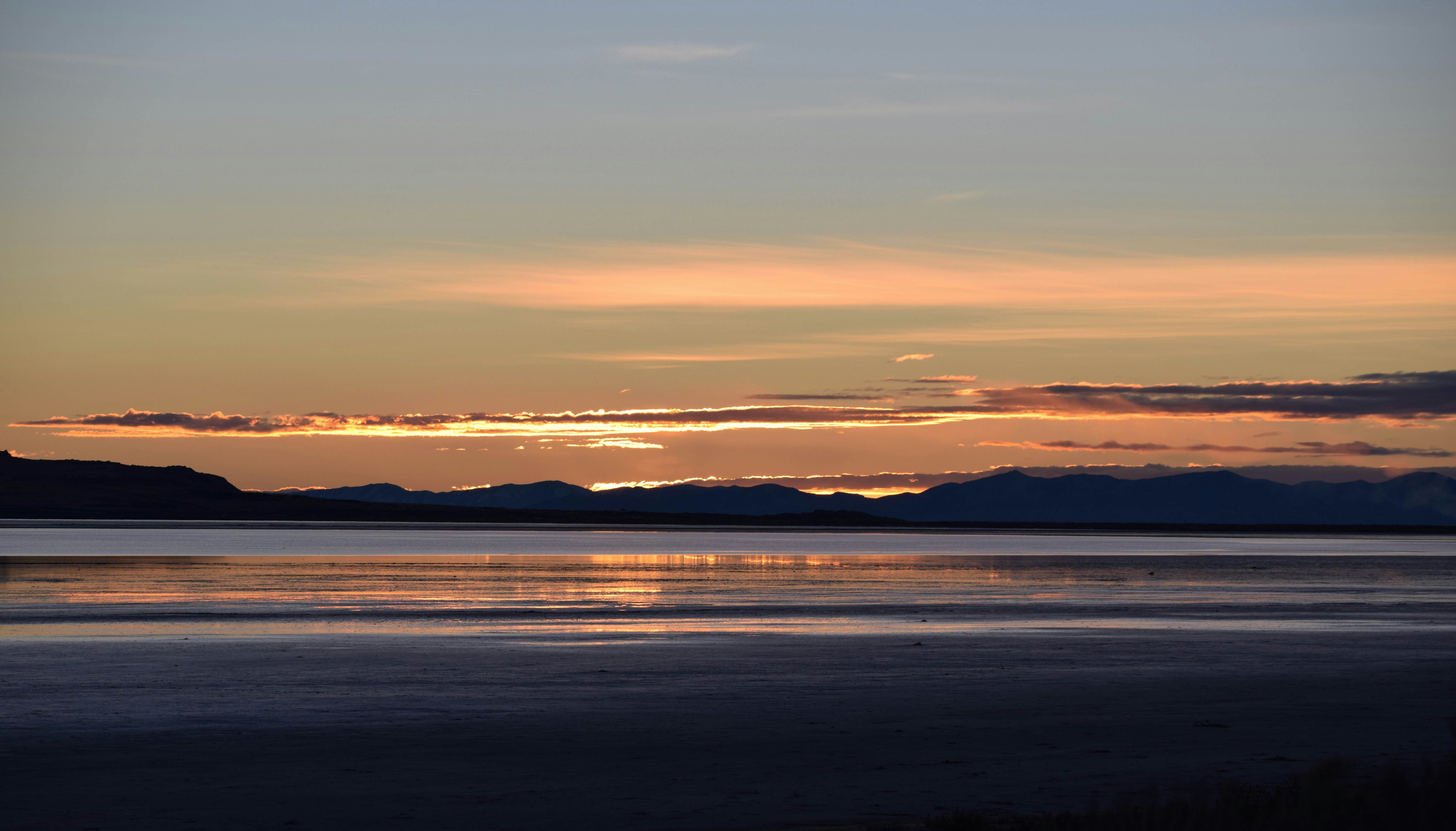 silhouette of mountain during sunset