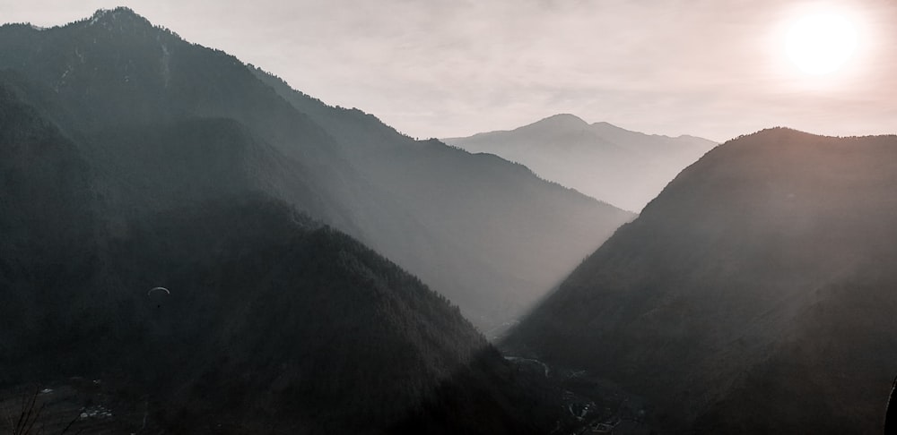 green mountains under white sky during daytime