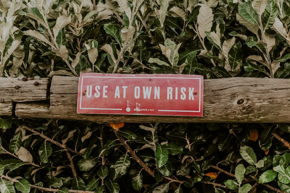 red and white wooden signage