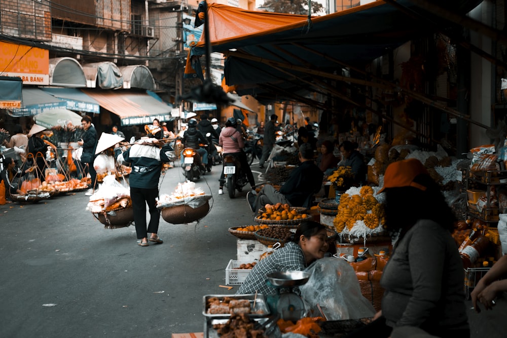 people sitting on street during daytime