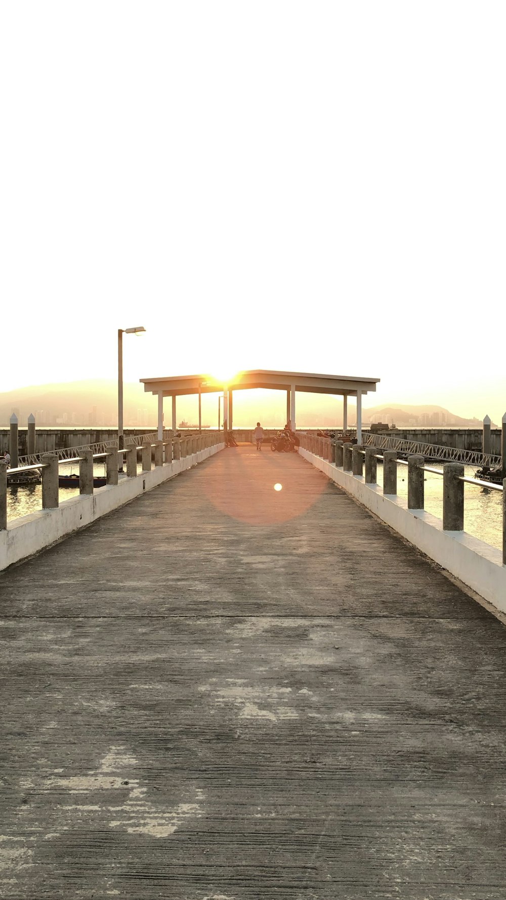 people walking on bridge during daytime