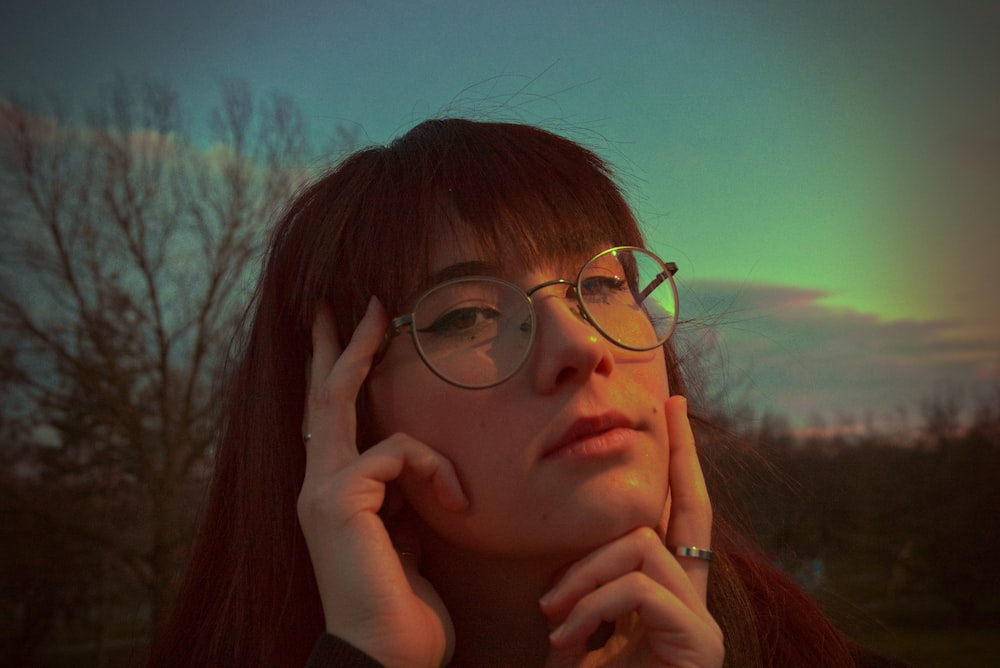 woman wearing black framed eyeglasses