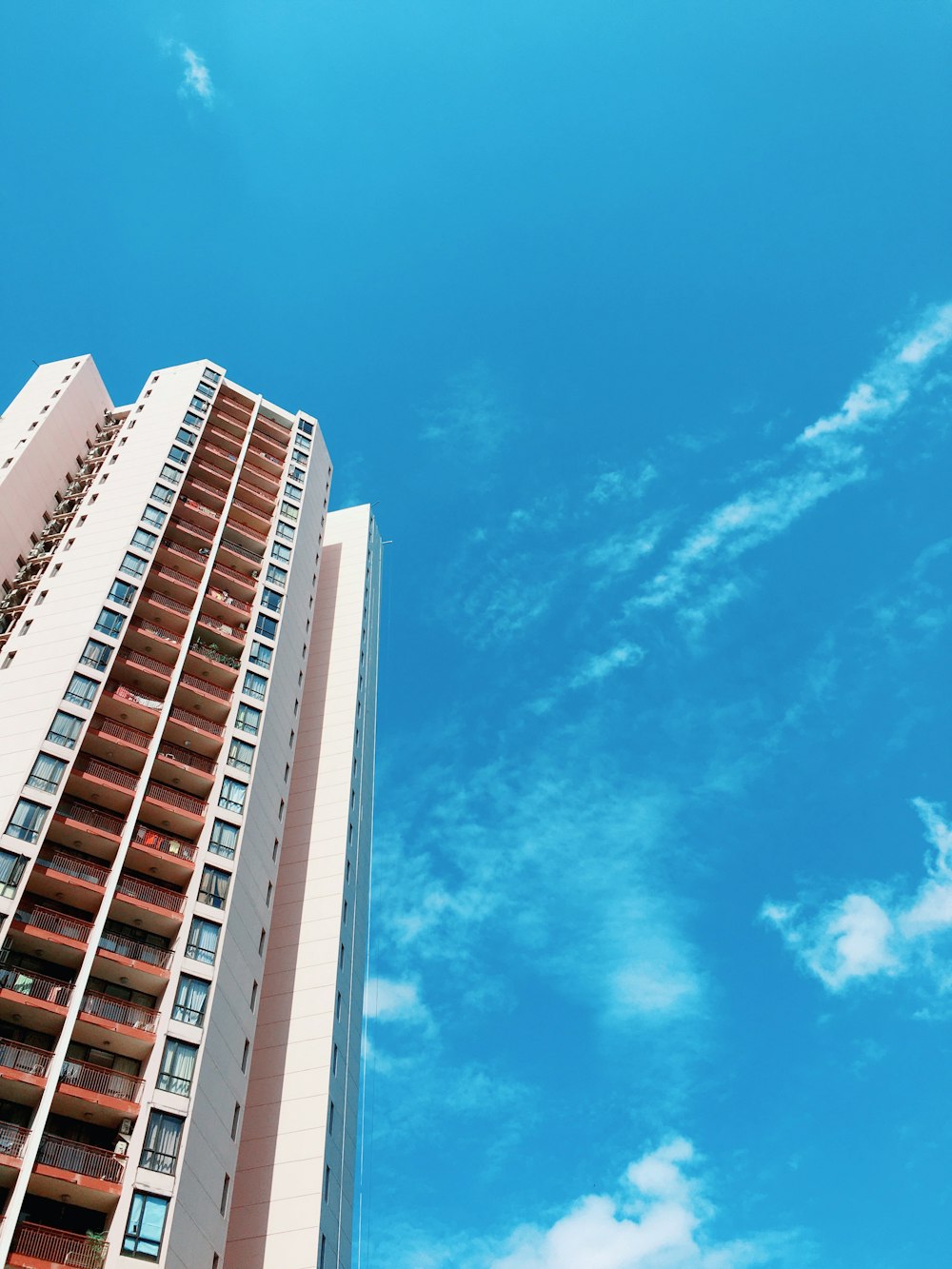 white concrete building under blue sky during daytime