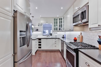 white and brown wooden kitchen cabinet