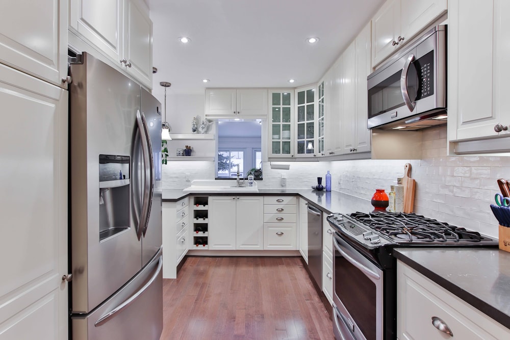 white and brown wooden kitchen cabinet