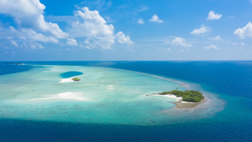 blue sea under blue sky during daytime