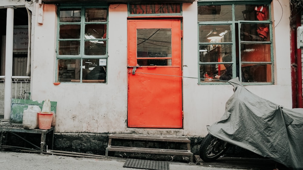 red and white wooden door