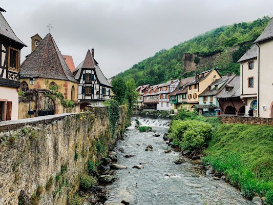 Kaysersberg and its river, along the wine road near Riquewihr — France