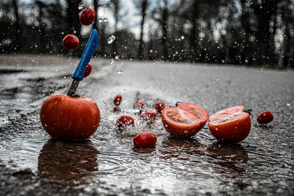 red apple fruit on water