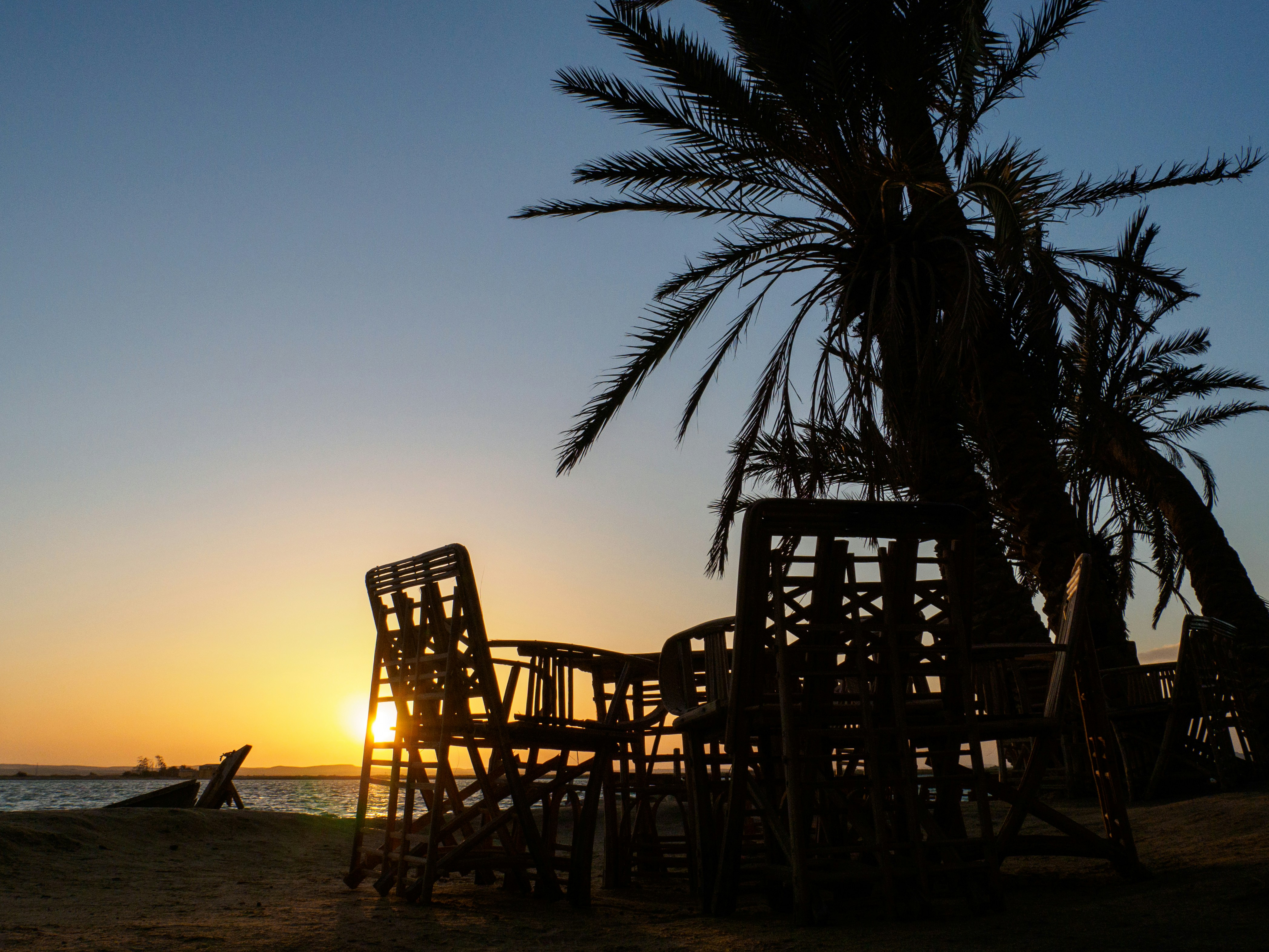 watching the sunset from Fatnas Island in the oasis of Siwa, Egypt