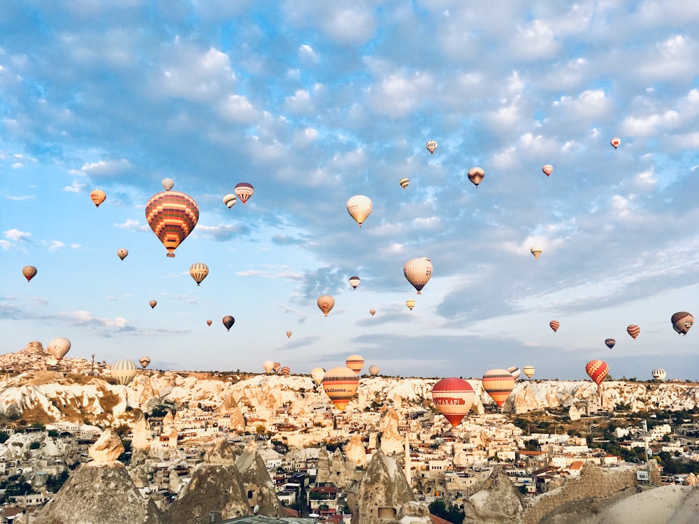 hot air balloons floating on sky during daytime