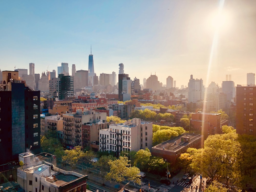 city skyline under blue sky during daytime