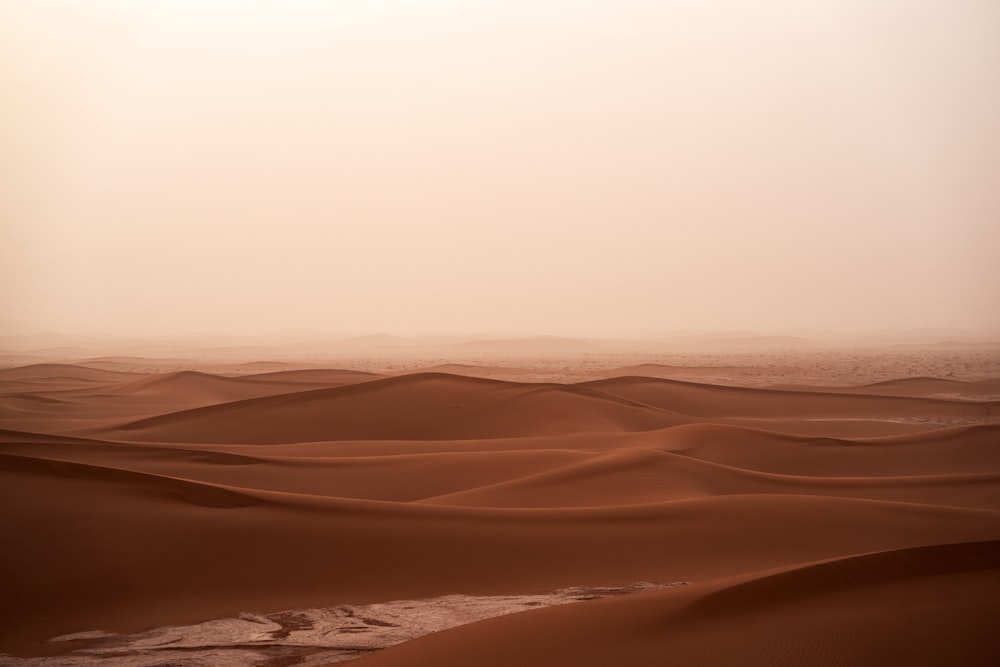 white sand under gray sky