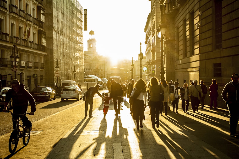 people walking on sidewalk during daytime