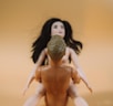 topless woman with black hair