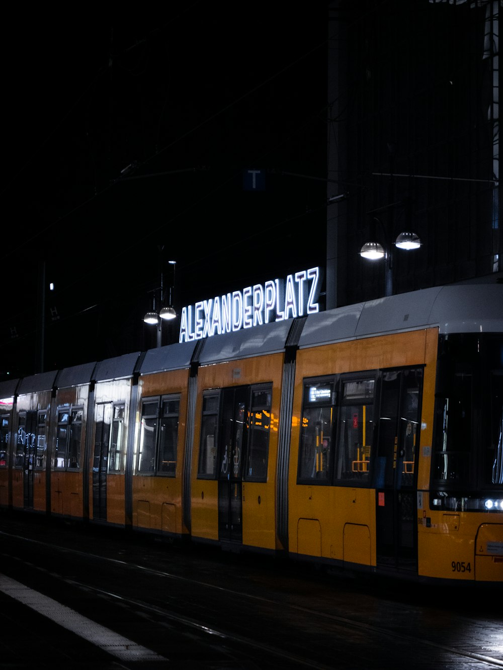yellow and white tram during night time