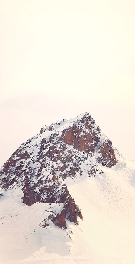 snow covered mountain during daytime in Le Monêtier-les-Bains France