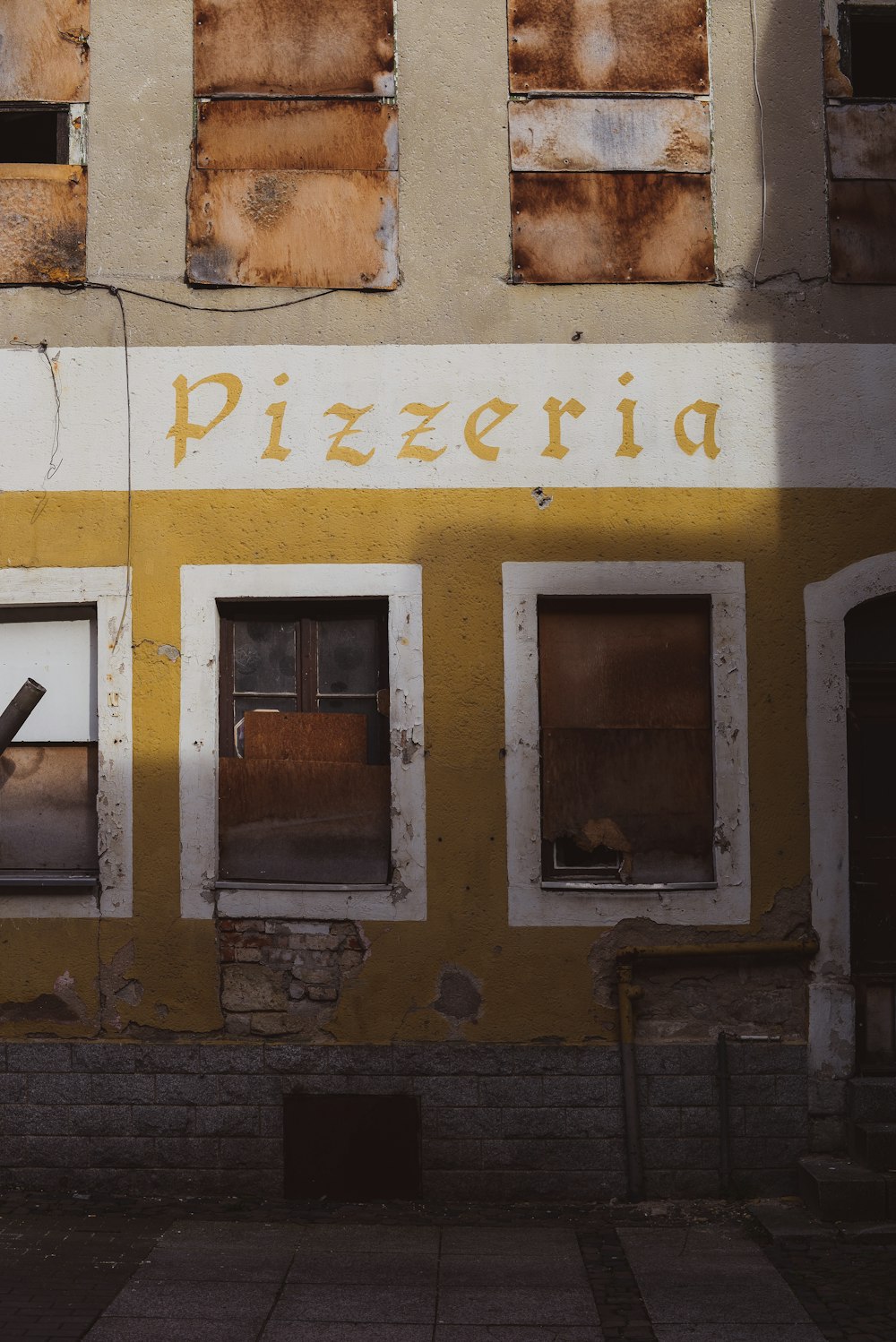 yellow and white wooden window