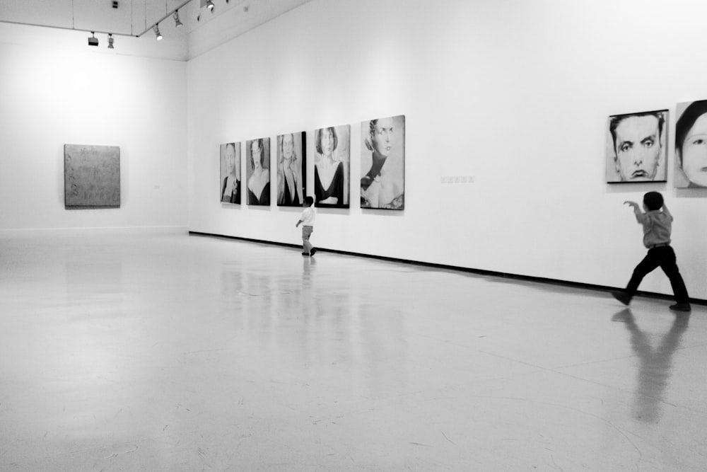 grayscale photo of people in a room