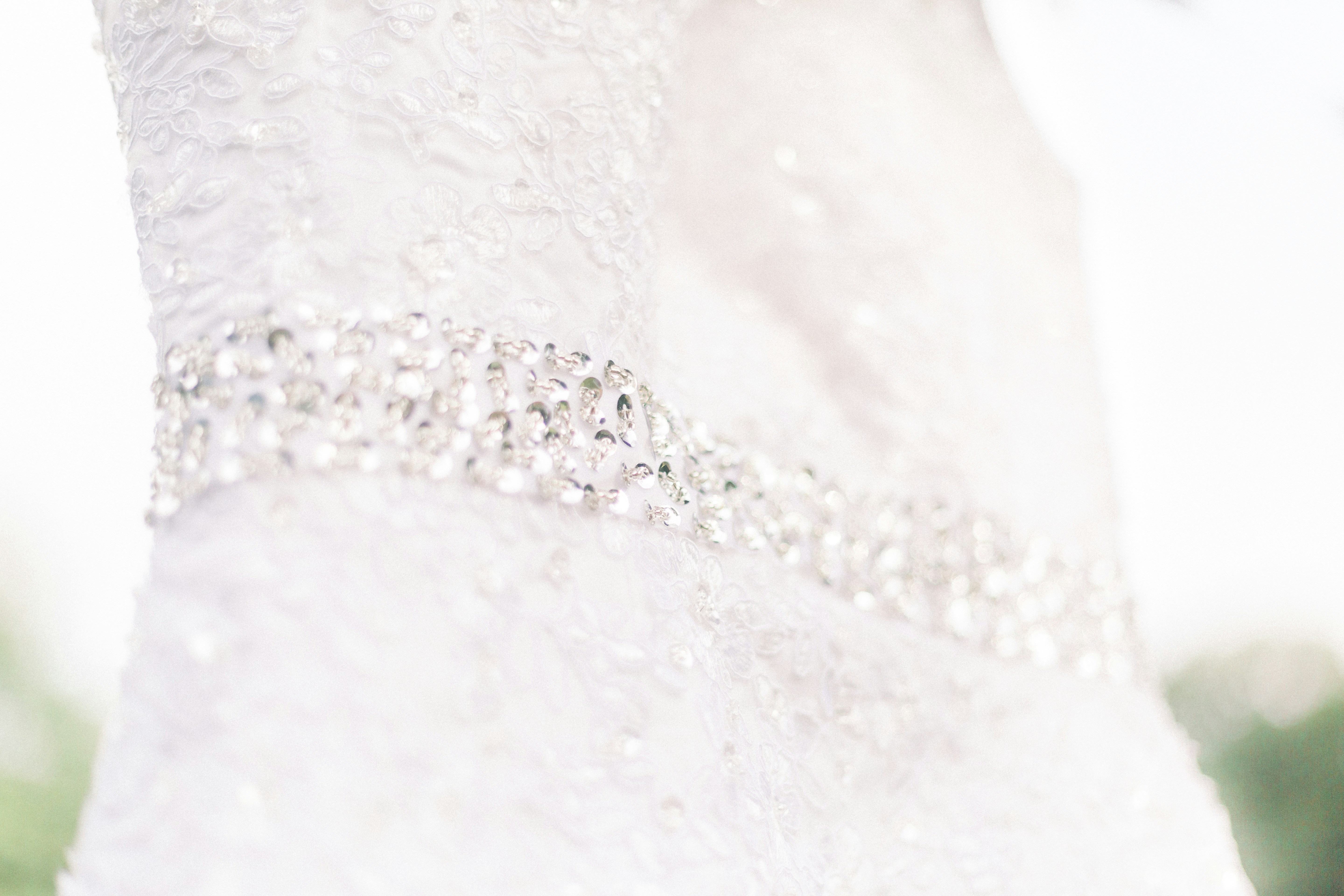 tessuto floreale bianco del merletto nell'immagine ravvicinata