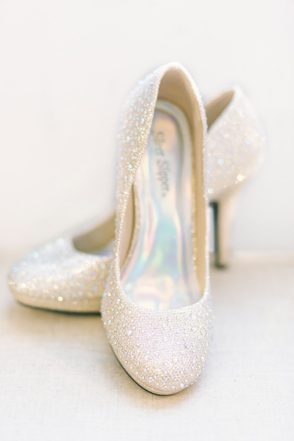 white peep toe heeled shoes