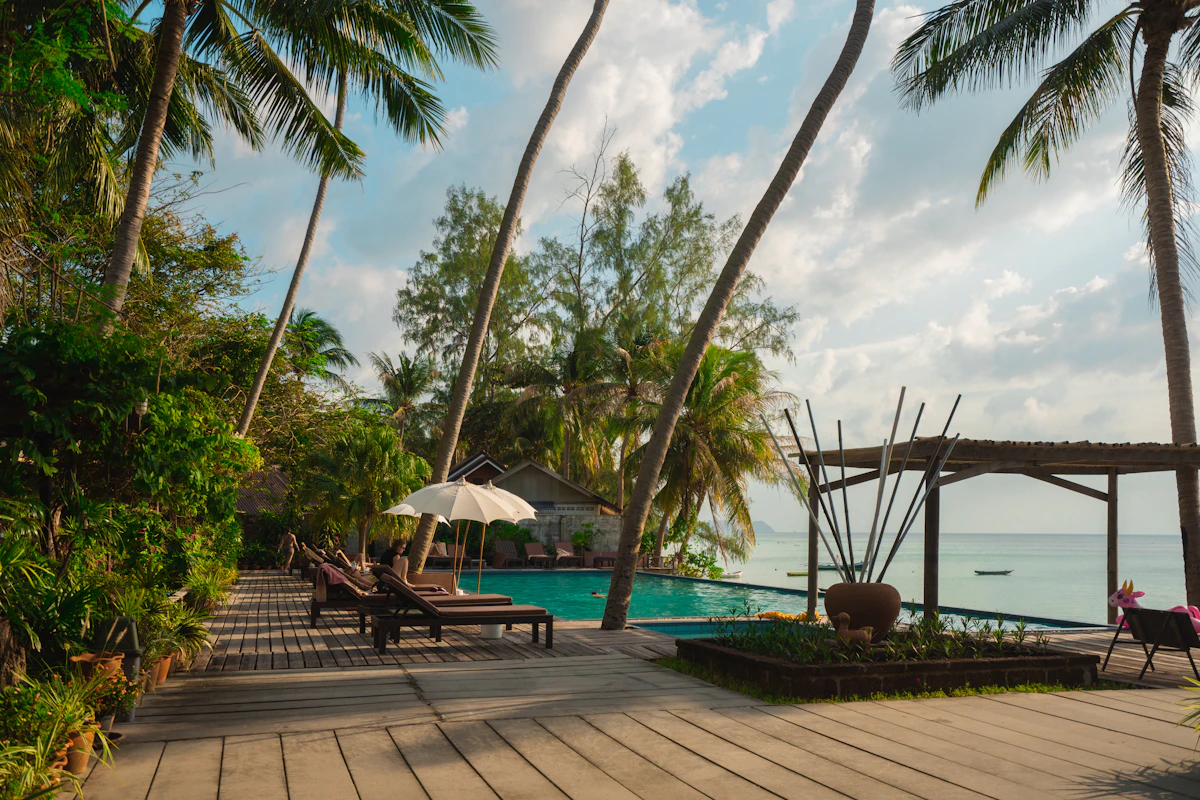 Beachfront lounges on a wooden deck
