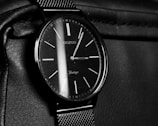 A classic stainless steel watch with a minimalist design.