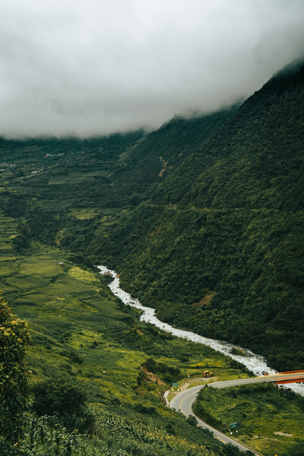 green mountains under white clouds during daytime