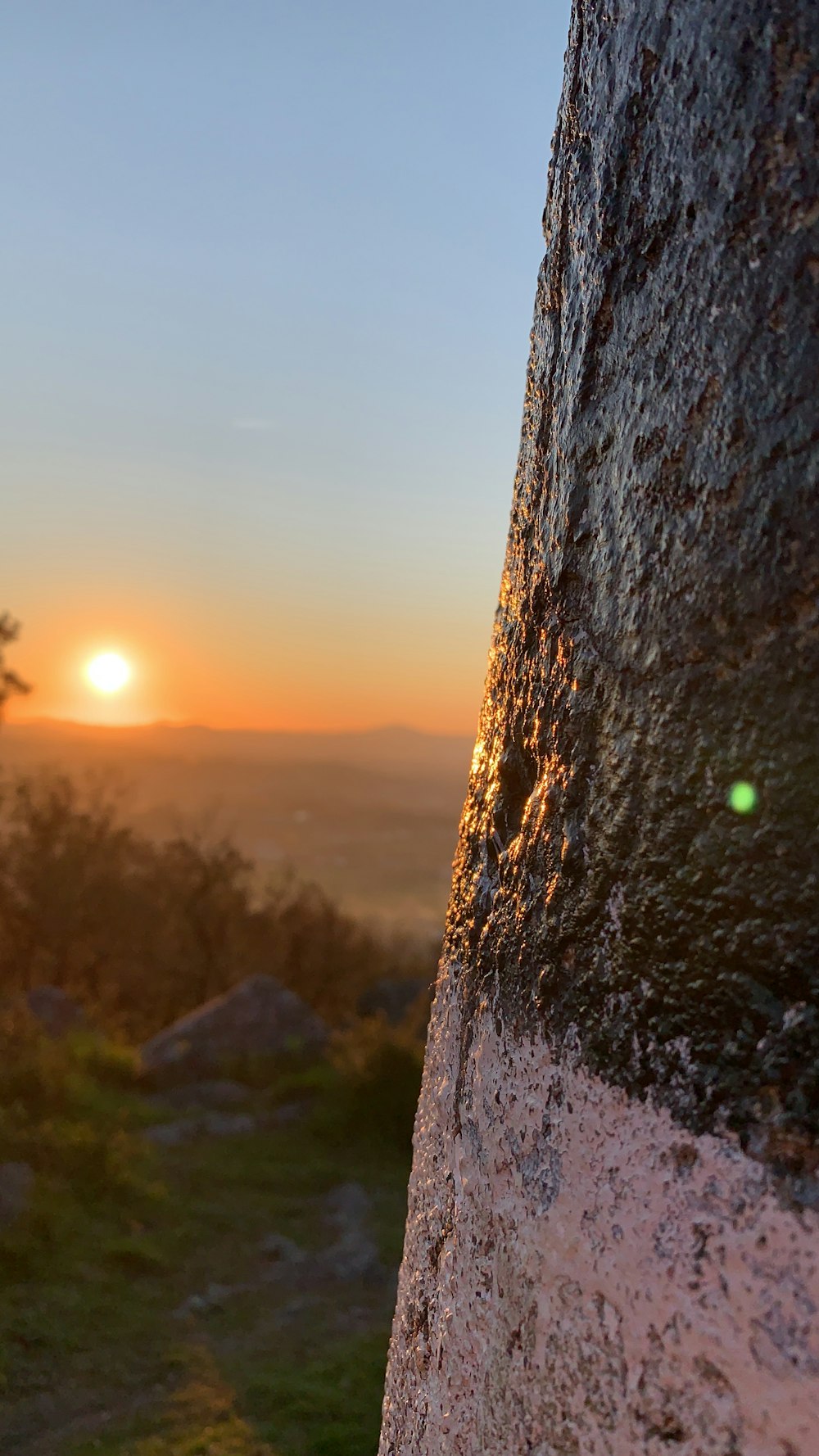 brown rock formation during sunset