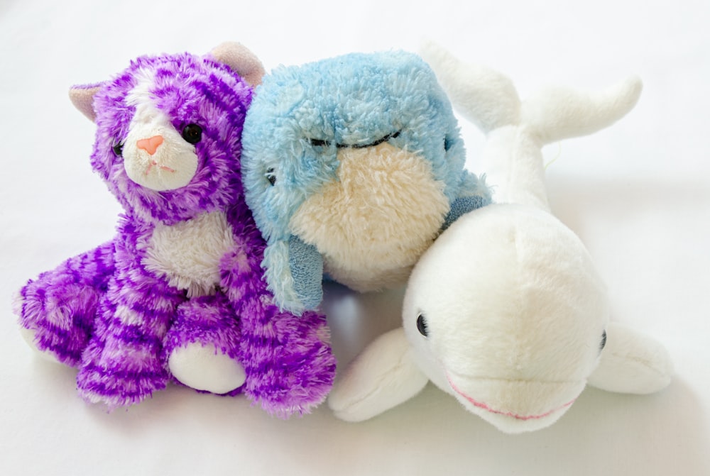 blue and purple bear plush toy