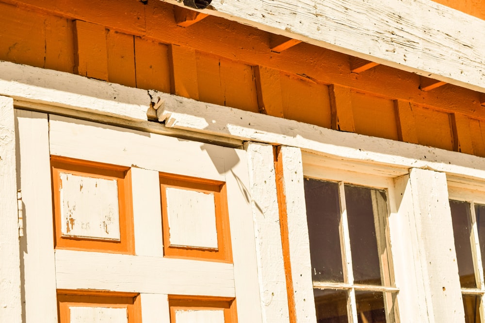 white wooden framed glass window