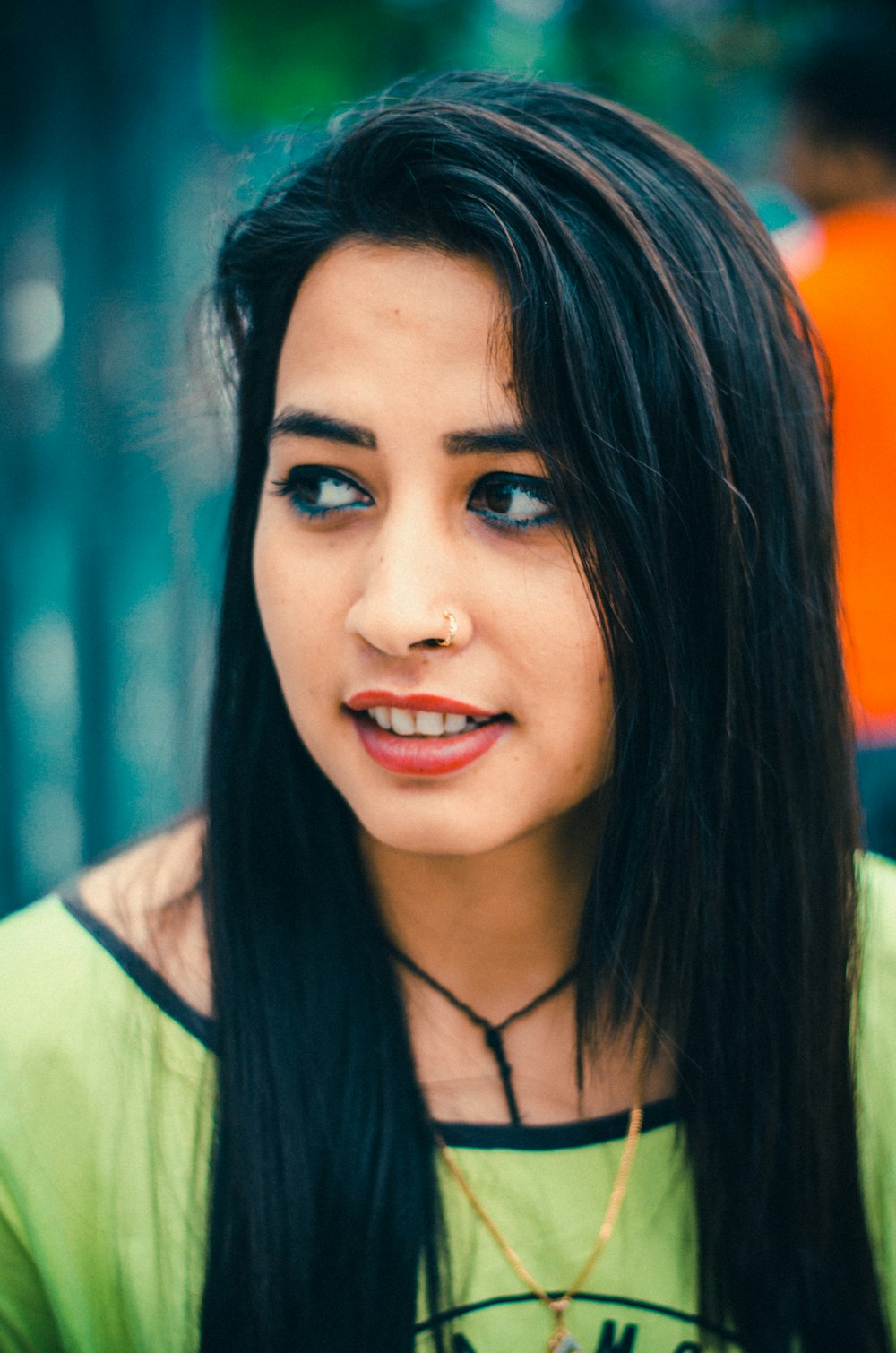 woman in yellow and white shirt