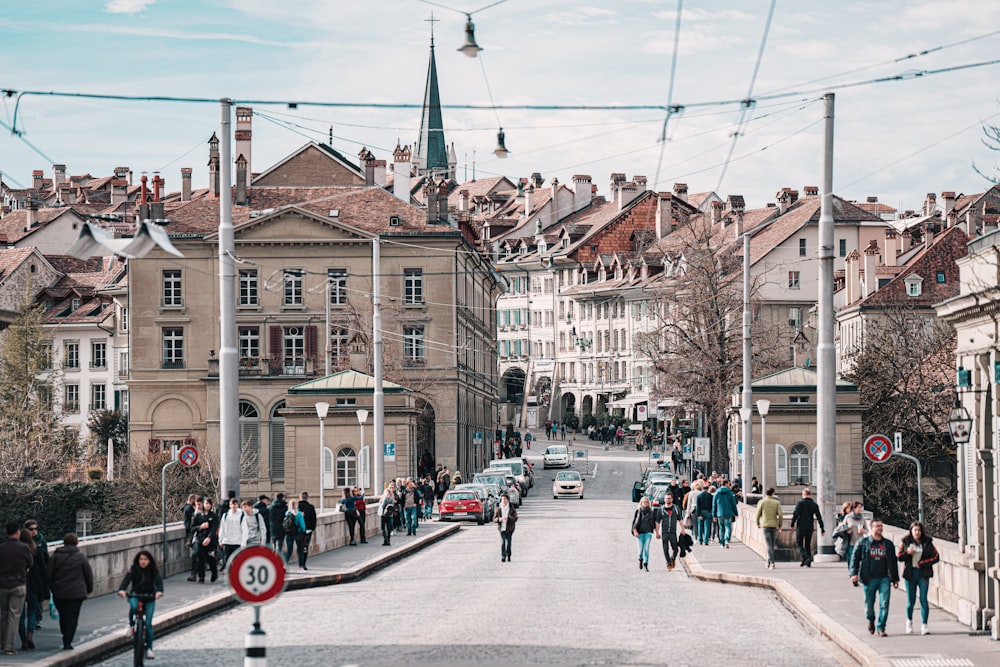 people walking on street near building during daytime