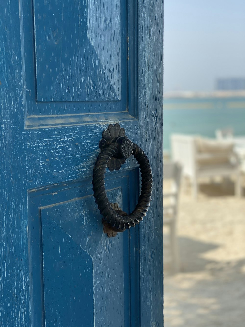 black rope on blue wooden wall