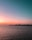 silhouette of island during sunset