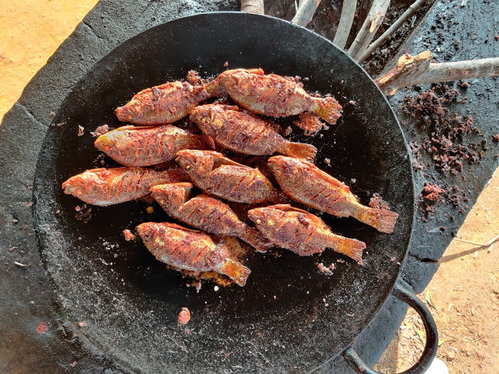 grilled meat on black pan