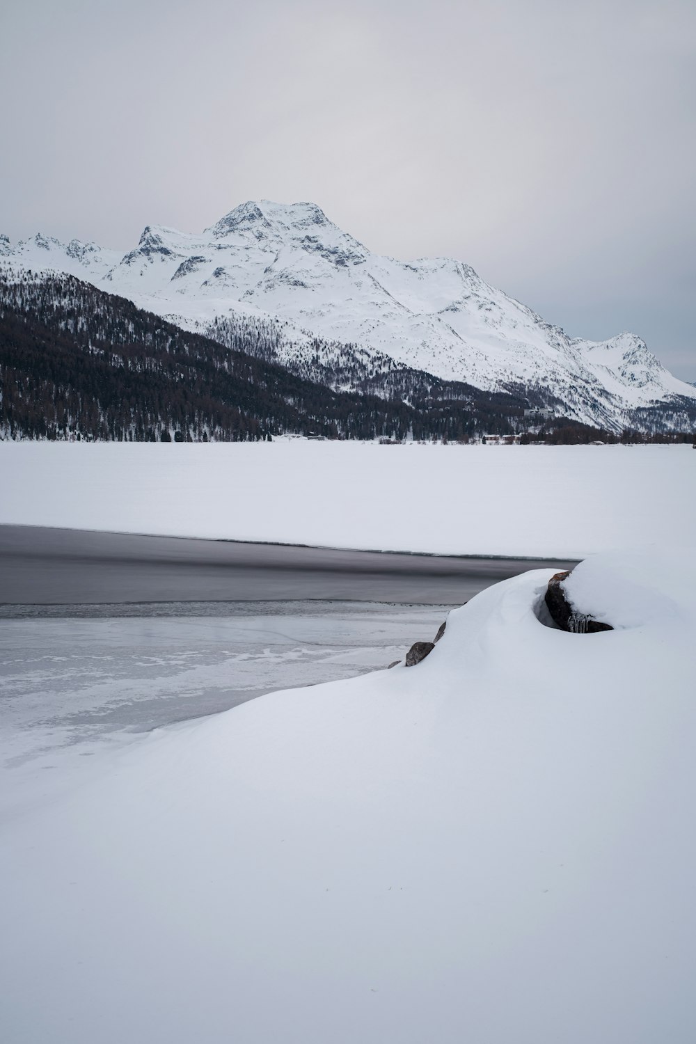 snow covered mountain during daytime