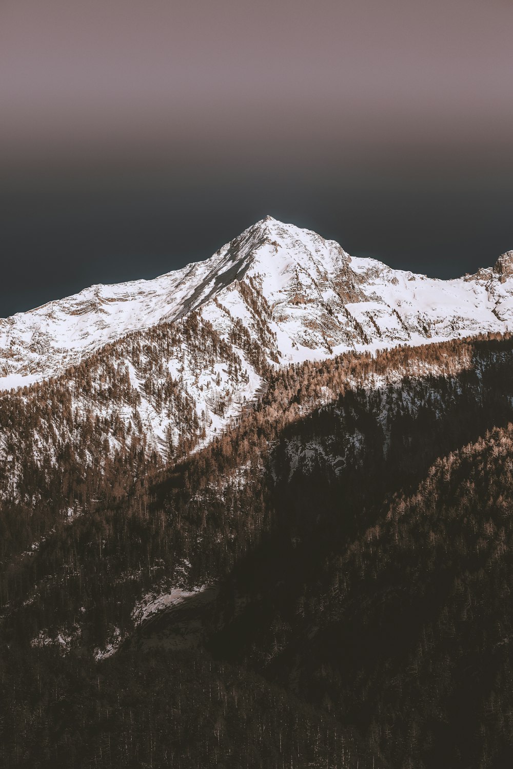 snow covered mountain during daytime