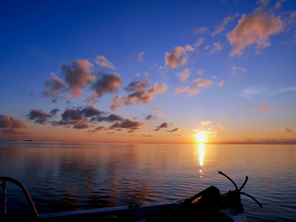 calm sea under blue sky during daytime