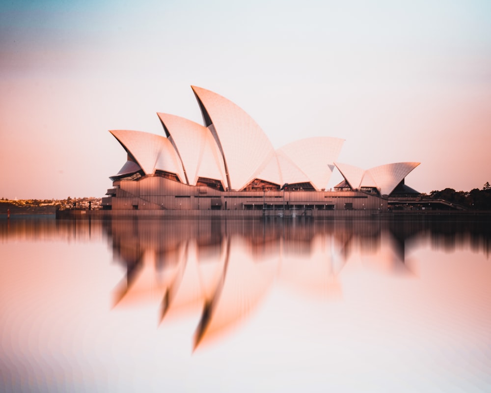 sydney opera house near body of water during daytime