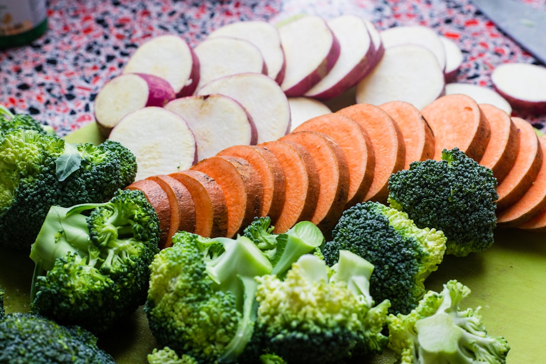 sliced carrots and green vegetable