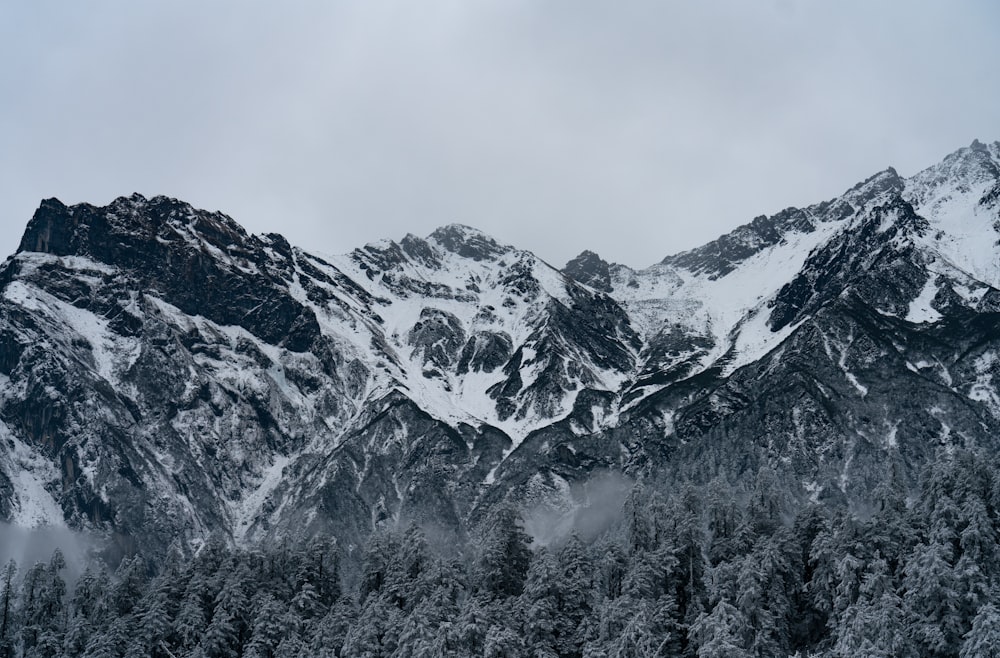 snow covered mountain during daytime