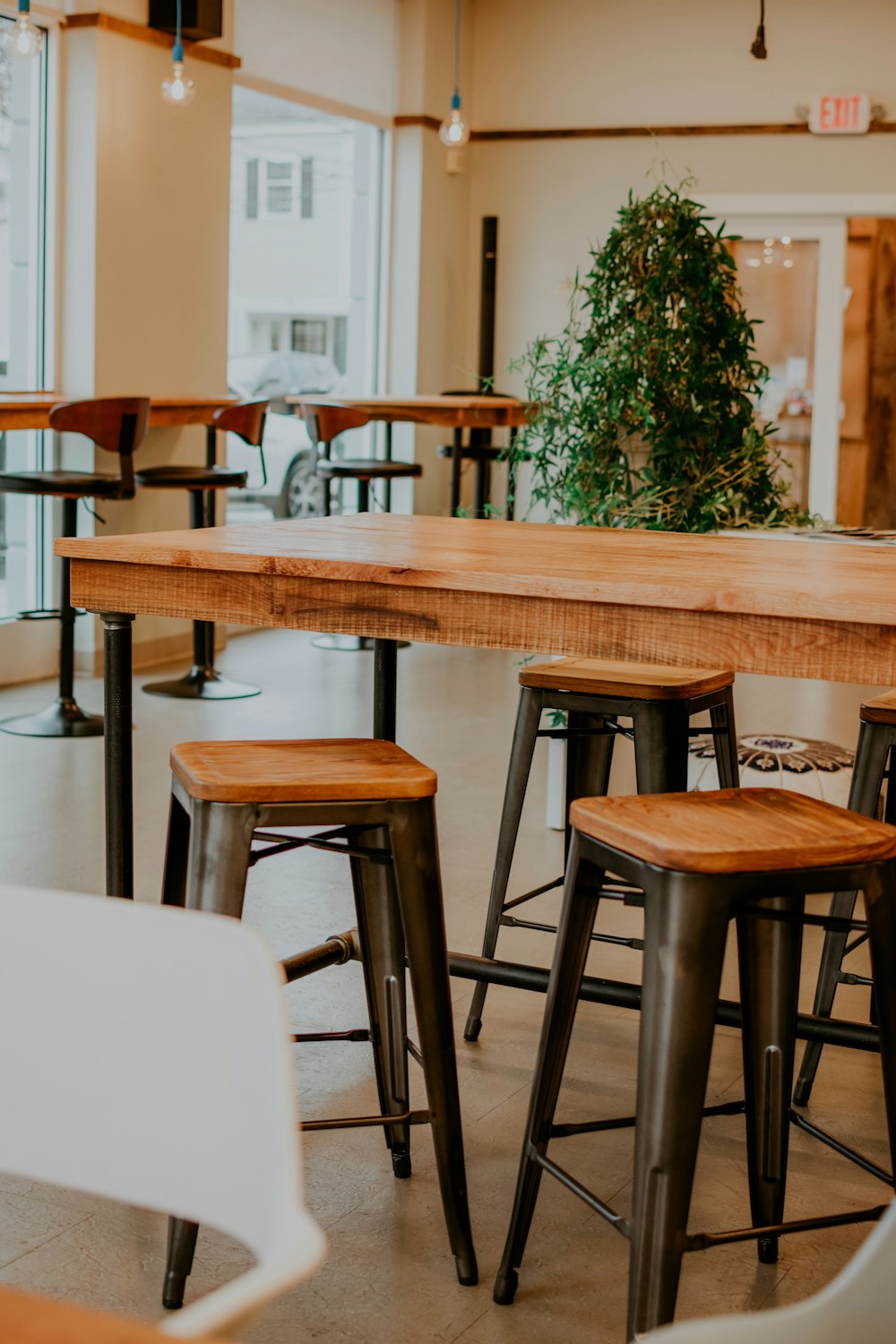 brown wooden table with chairs