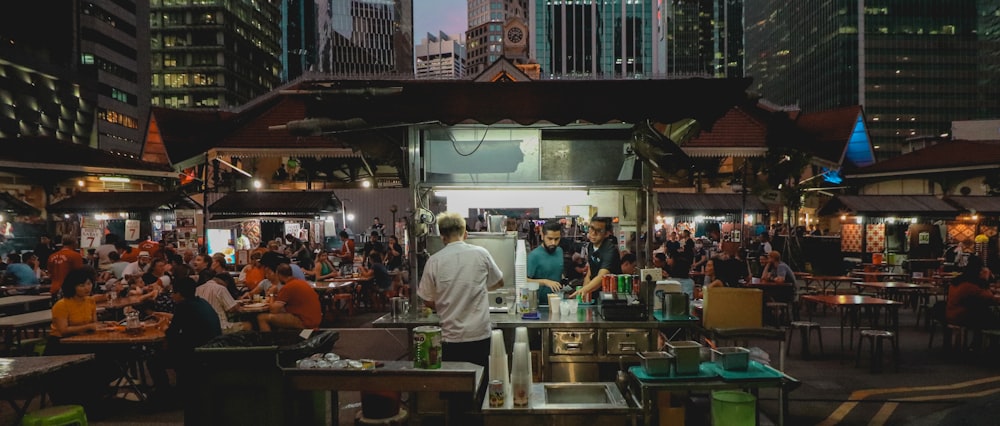 people standing in front of store during daytime