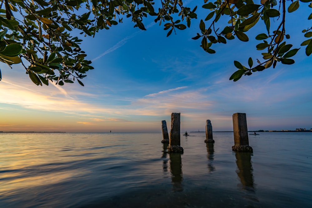 body of water under blue sky during daytime