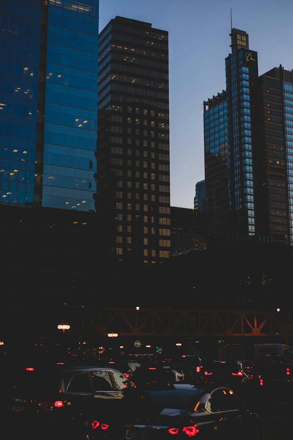 blue and black high rise building during nighttime