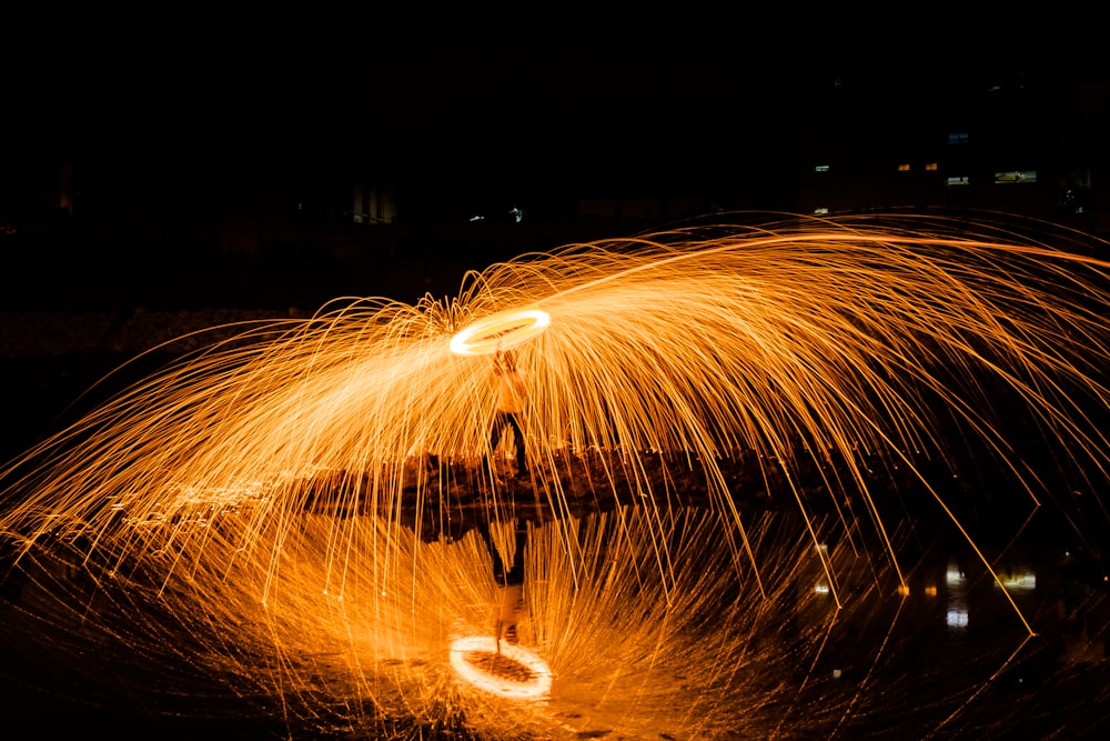 time lapse photography of fireworks during night time