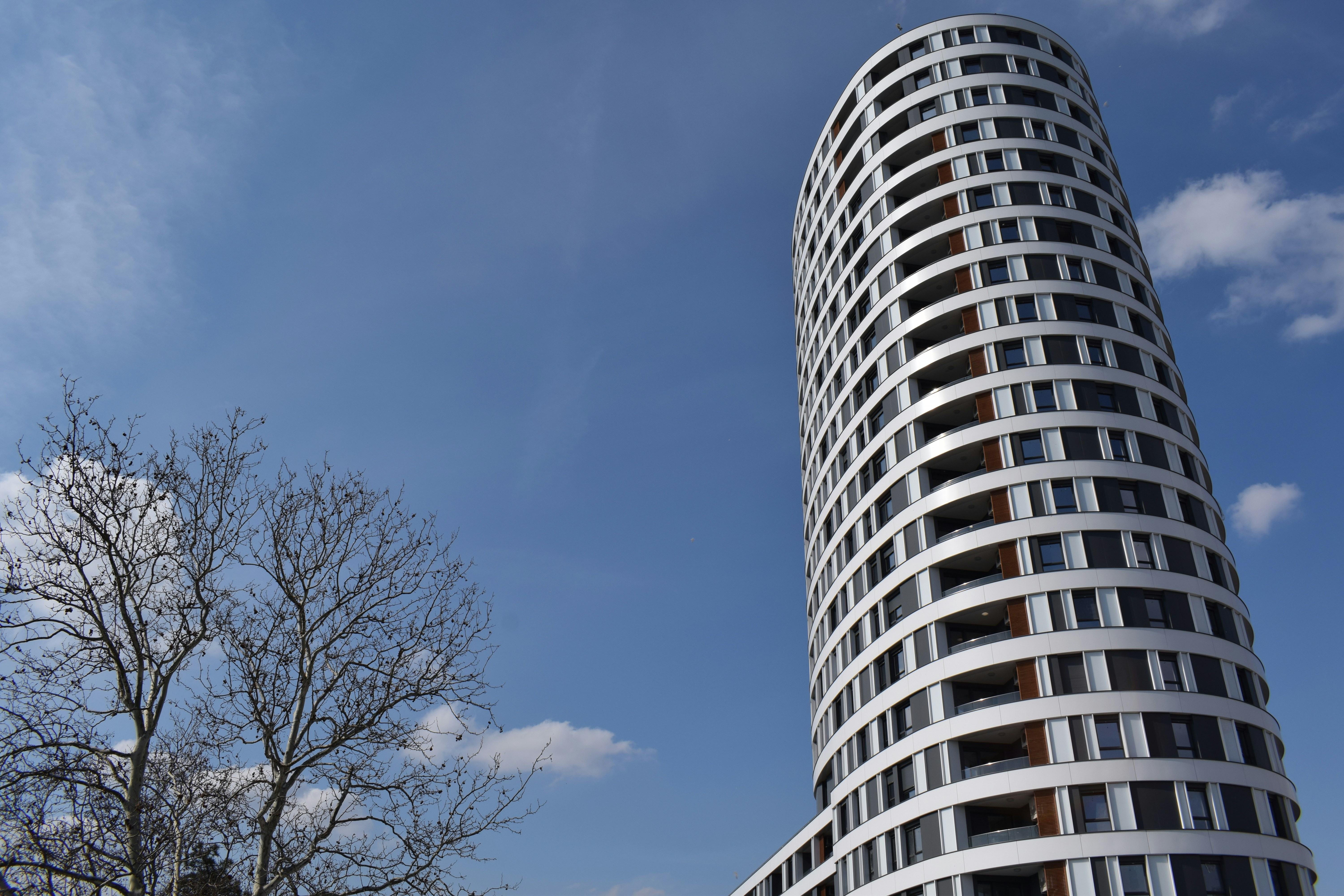 white concrete building under blue sky during daytime