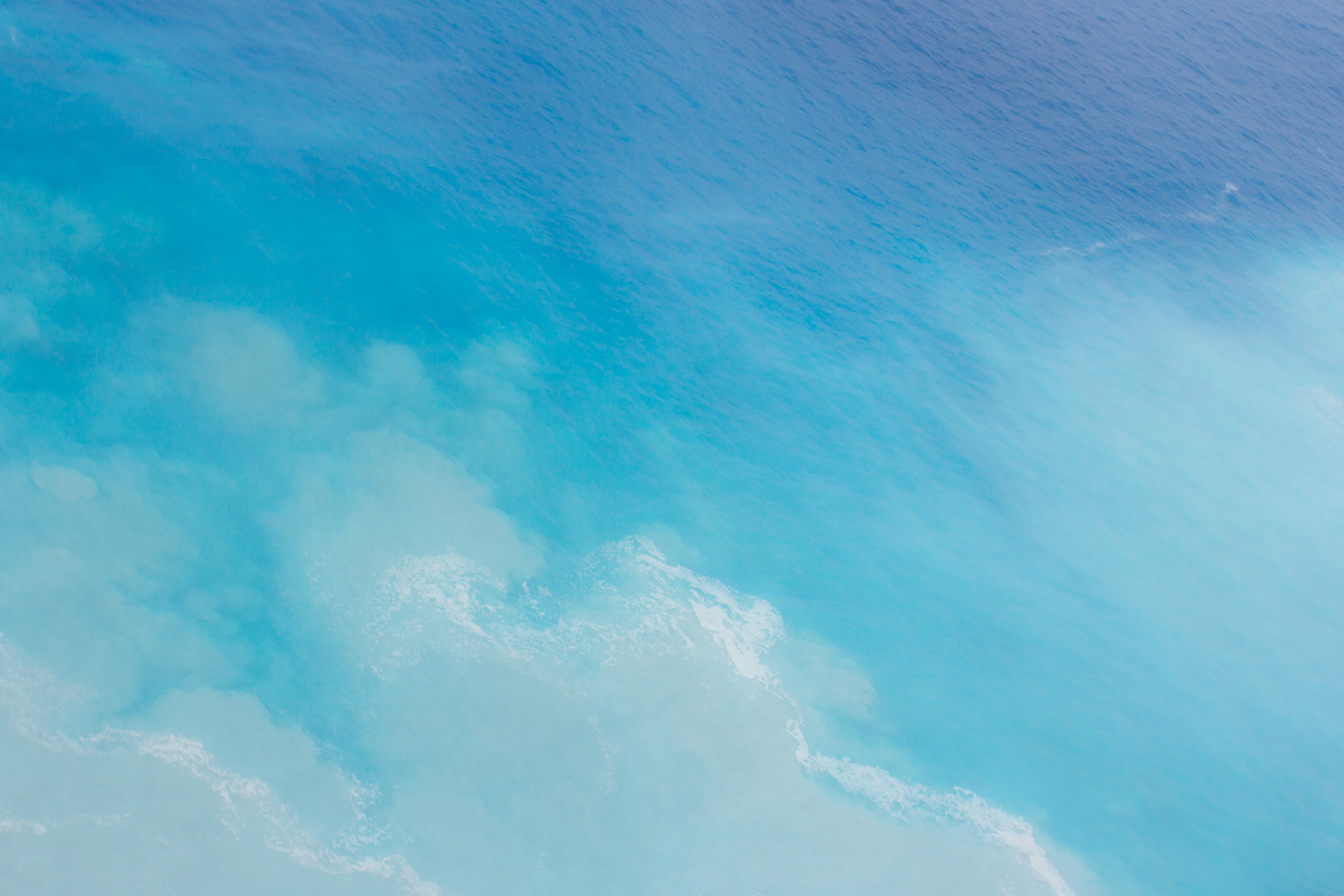 Caribbean Dream Larimar gemstone with ocean blue and white swirling mineral patterns