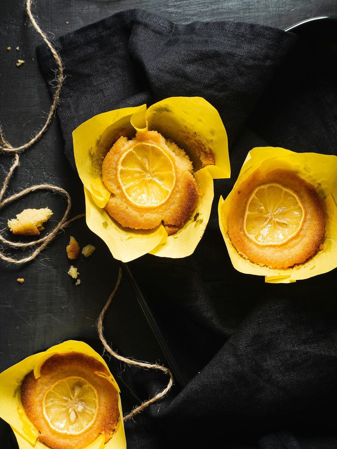 sliced yellow fruit on black textile